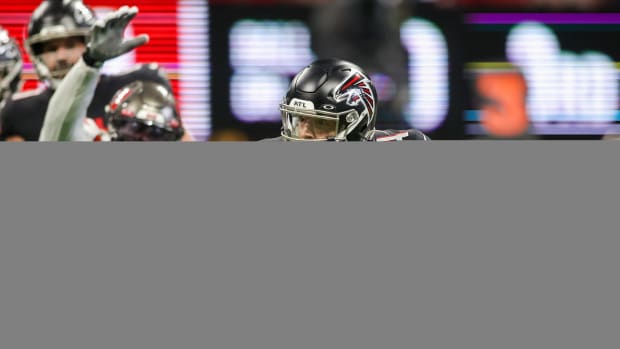 Jan 8, 2023; Atlanta, Georgia, USA; Atlanta Falcons quarterback Desmond Ridder (4) scrambles against the Tampa Bay Buccaneers in the second quarter at Mercedes-Benz Stadium. Mandatory Credit: Brett Davis-USA TODAY Sports